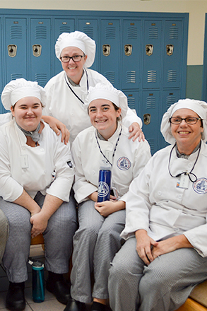 group of culinary students in their uniforms