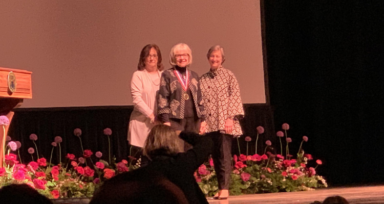 Professor Effie Russell receiving award