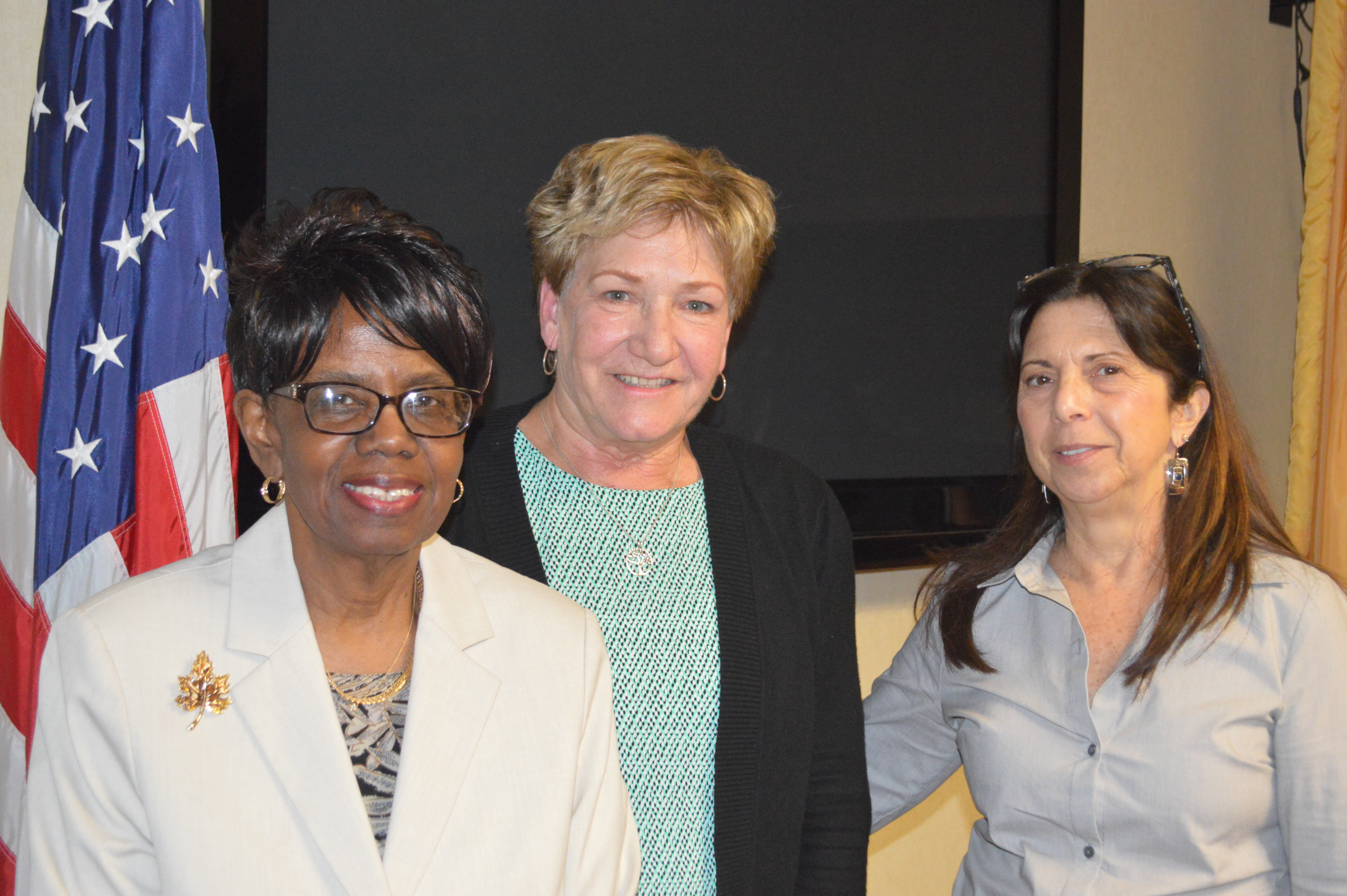 Atlantic Cape President Dr. Barbara Gaba and Board Chairperson Maria Mento with Patricia Kubaska at the April 26 Board of Trustees meeting. 