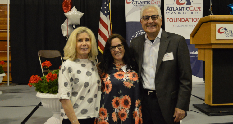 Scholarship recipient Charlene Maycott with Atlantic Cape Foundation Board Secretary Stephen Nehmad and his wife, Diane, at the Scholarship Recognition Ceremony May 16, 2022 at the gymnasium on the Mays Landing campus of Atlantic Cape Community College.