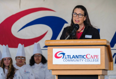 Dr. Denise Coulter speaks at the Academy of Culinary Arts graduation on May 17