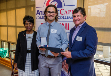 Mr. Zachary Pashley receives his Young Alumni Award