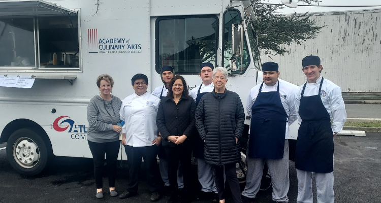 Academy of Culinary Arts students in front of Atlantic Cape's Let's Chow Food Truck