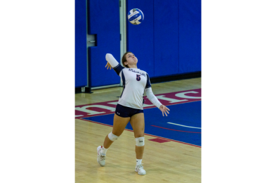 Atlantic Cape Women's Volleyball player serves the ball